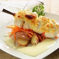 Gratinerte fiskeboller i hvit saus